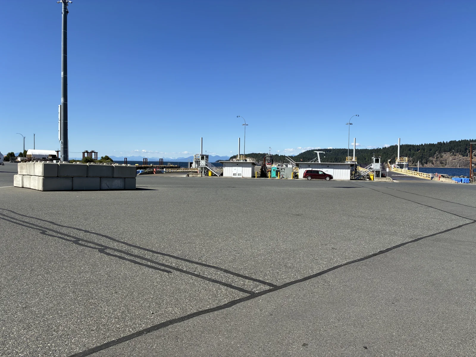 Sealed cracks across an industrial asphalt yard at Seaspan.
