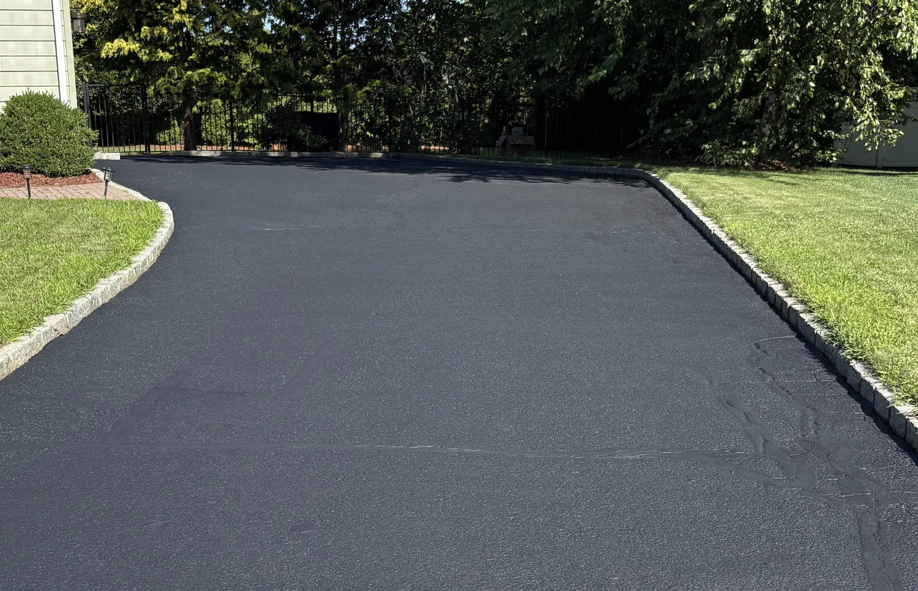 A newly sealed residential driveway in Duncan.